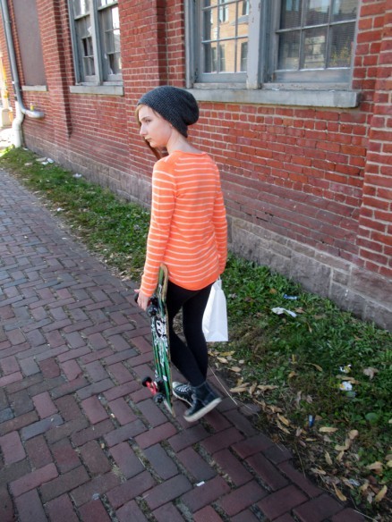 My daughter with her $12 skateboard-artifact